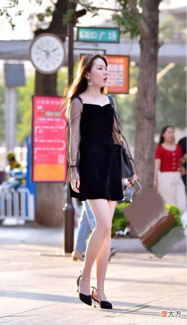 【就爱时尚】典雅型黑色短裙，蕾丝袖的设计，格外抢眼